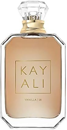Perfume Kayali Vanilla 28 EDP 50 ml frasco transparente con líquido ámbar y tapón dorado